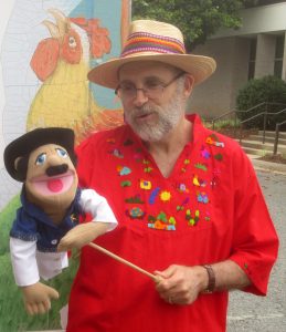 jon-with-sr-gomez-in-front-of-hispanic-bookmobile-rooster
