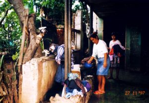 women-washing-clothes-in-abandonned-apartment-building-managua-nicaragua