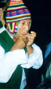 andean-musician-with-traditional-knitted-cap-and-vest