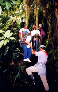 costa-rican-cloud-forest-guide-helping-hiker-down